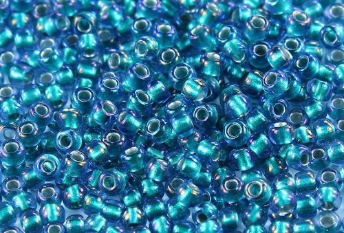 Toho Rocailles Inside-Color Rainbow Crystal/Green Teal Lined TR-06-274